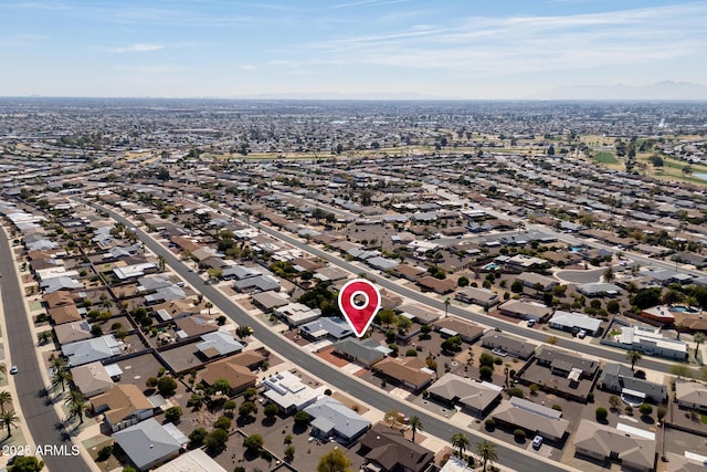 birds eye view of property featuring a view of city and a residential view