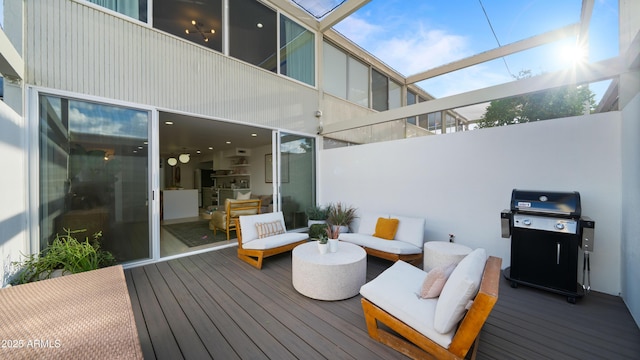 wooden terrace featuring grilling area