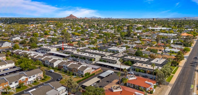 drone / aerial view featuring a mountain view and a residential view