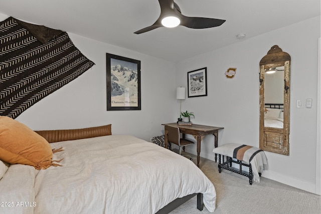 bedroom featuring carpet flooring, baseboards, and a ceiling fan