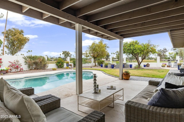 view of swimming pool with a patio, a fenced backyard, a fenced in pool, and an outdoor living space