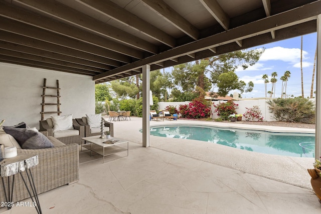 view of pool with a patio area, an outdoor living space, a fenced in pool, and a fenced backyard