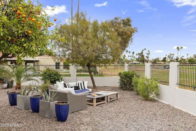 view of patio with an outdoor hangout area and fence