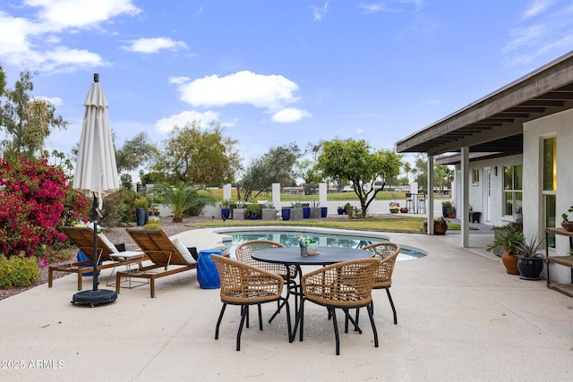 outdoor pool featuring a patio area