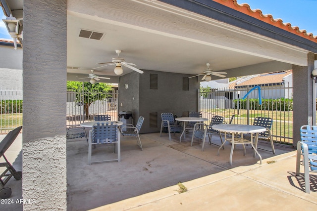 view of patio featuring ceiling fan