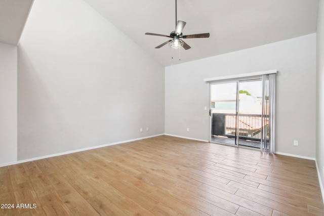 unfurnished living room with light wood-type flooring, high vaulted ceiling, and ceiling fan