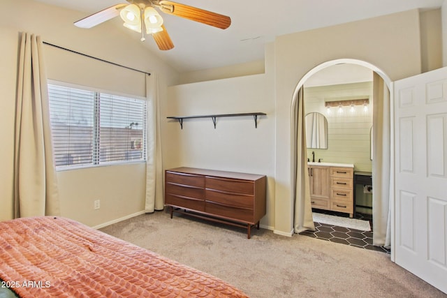 3440 E Southern Ave Unit 1042, Mesa, AZ 85204 - bedroom with carpet floors, connected bathroom, and ceiling fan