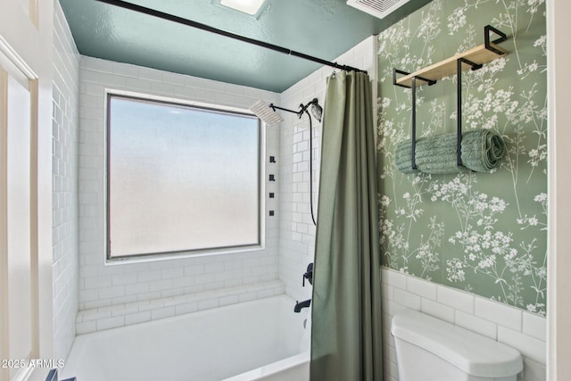 3440 E Southern Ave Unit 1042, Mesa, AZ 85204 - bathroom featuring wallpapered walls, shower / bath combo with shower curtain, a wainscoted wall, and tile walls