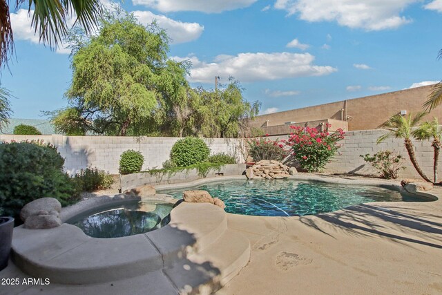 3440 E Southern Ave Unit 1042, Mesa, AZ 85204 - view of swimming pool with a fenced backyard, a pool with connected hot tub, and a patio