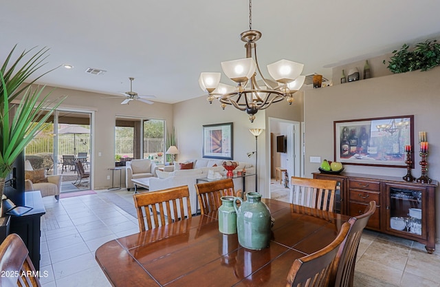 dining area featuring ceiling fan with notable chandelier, light tile patterned flooring, visible vents, and recessed lighting