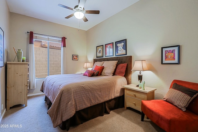 bedroom with ceiling fan and light colored carpet