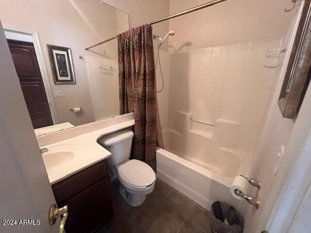 full bathroom featuring vanity, shower / bath combination with curtain, tile patterned floors, and toilet