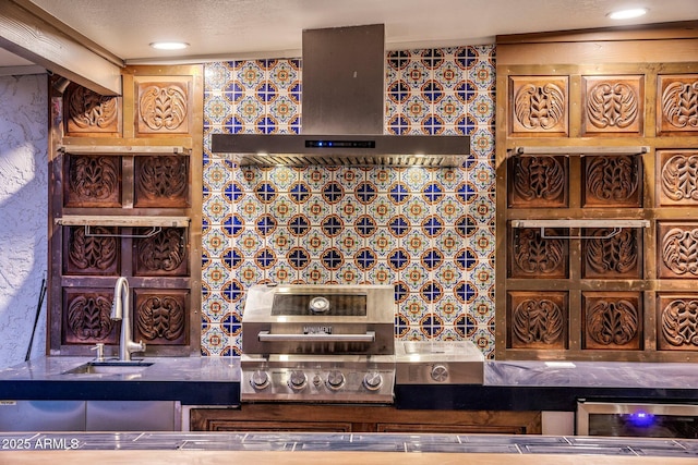 wine room with sink and a textured ceiling