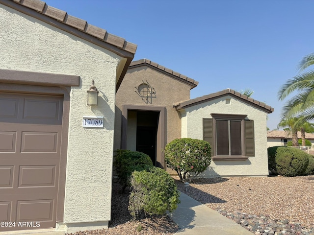 entrance to property with a garage