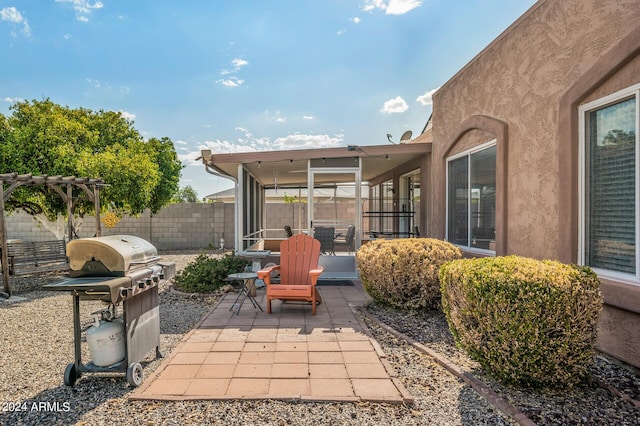 view of patio featuring a fenced backyard and area for grilling