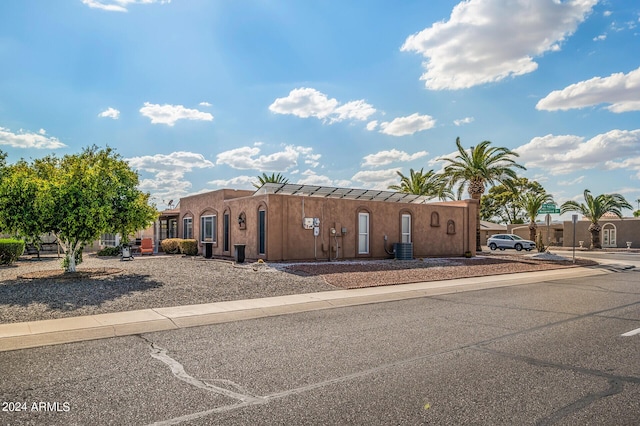 adobe home with stucco siding