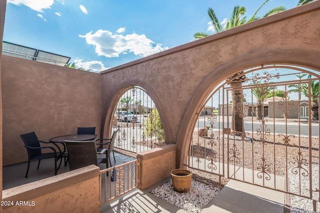 view of patio / terrace with a gate and fence