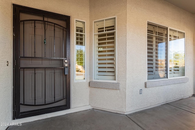 entrance to property with covered porch