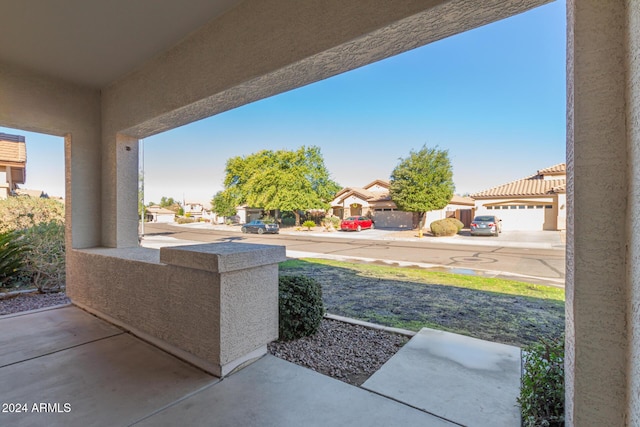 view of patio / terrace with a garage