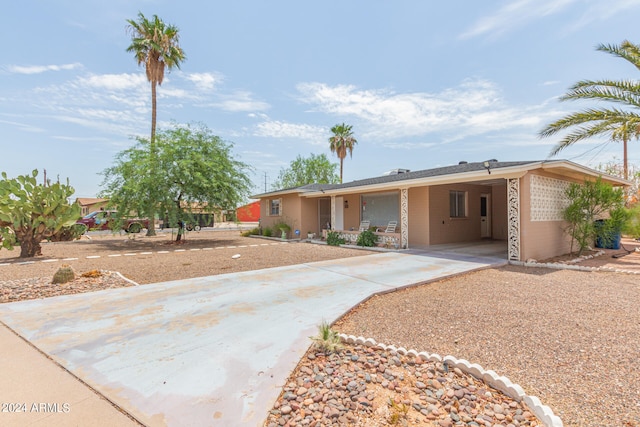 view of front of house featuring a carport