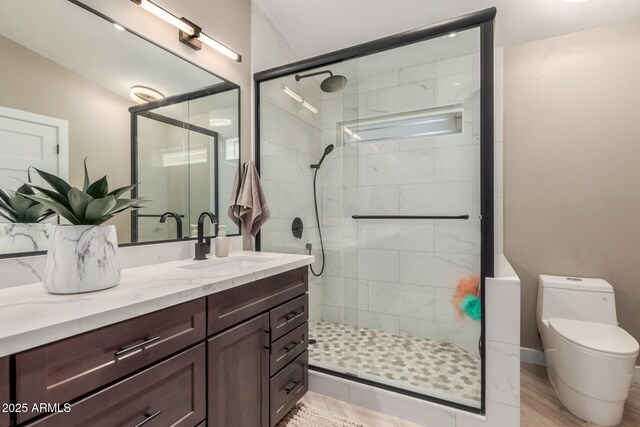 6357 W Potter Dr, Glendale, AZ 85308 - bathroom featuring vanity, a shower stall, and toilet