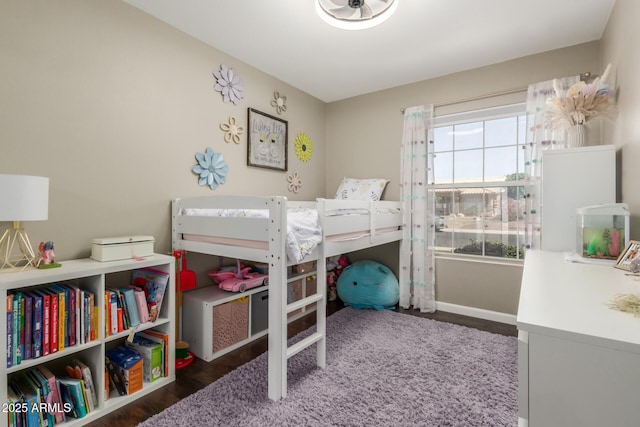 6357 W Potter Dr, Glendale, AZ 85308 - bedroom with wood finished floors and baseboards
