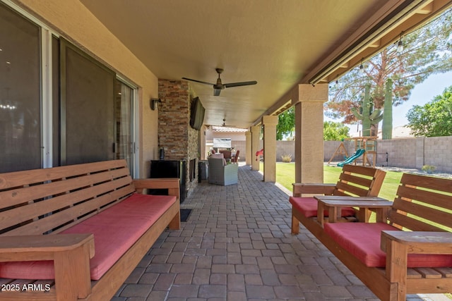 6357 W Potter Dr, Glendale, AZ 85308 - fenced backyard with a patio, ceiling fan, and a playground