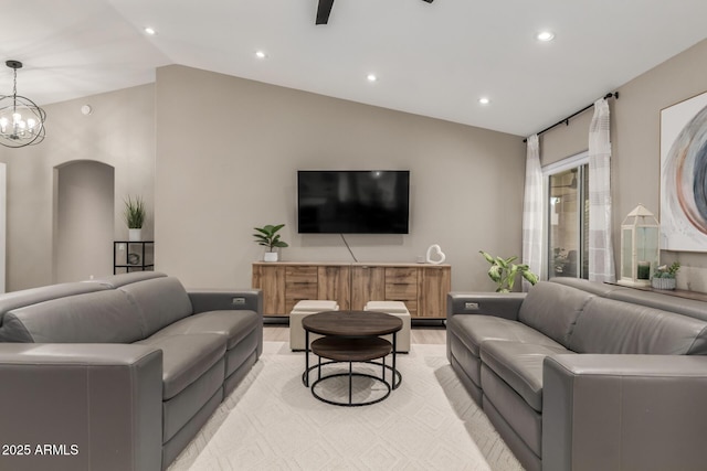 6357 W Potter Dr, Glendale, AZ 85308 - living area with lofted ceiling, light wood-style flooring, recessed lighting, arched walkways, and a chandelier
