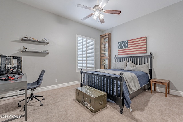 bedroom with ceiling fan and light carpet