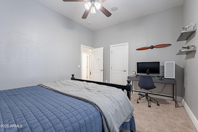 carpeted bedroom featuring ceiling fan and lofted ceiling