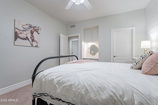 bedroom with ceiling fan and light colored carpet