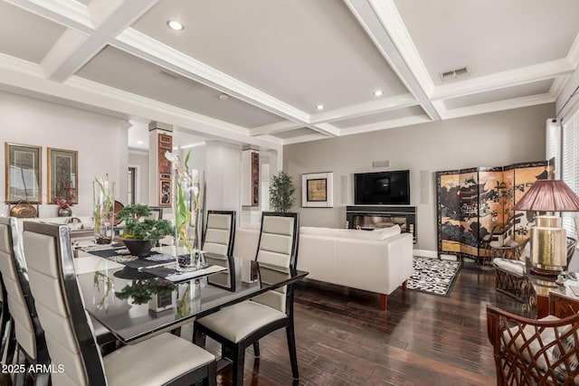 dining room with visible vents, beamed ceiling, coffered ceiling, wood finished floors, and recessed lighting
