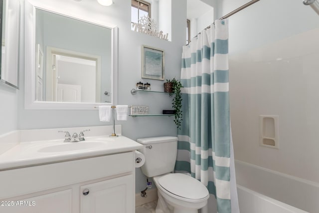 full bathroom featuring toilet, vanity, and shower / tub combo