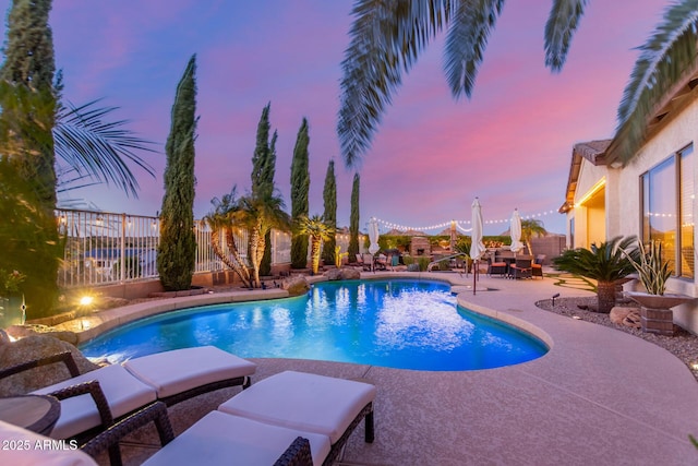 view of swimming pool with a patio, a fenced backyard, and a fenced in pool
