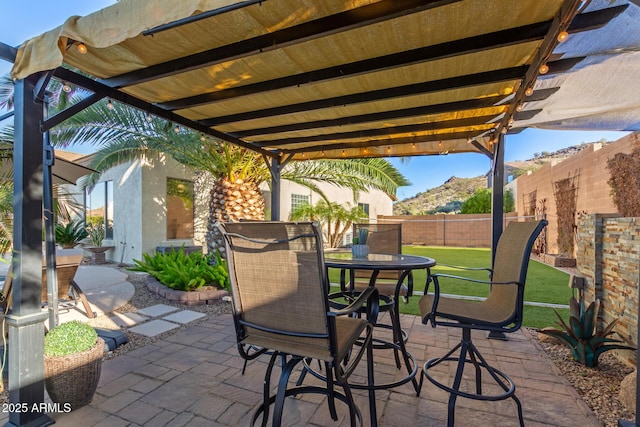 view of patio / terrace with outdoor dining area and a fenced backyard