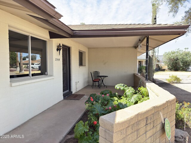 view of patio featuring a porch
