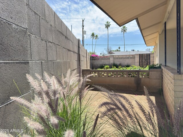 exterior space featuring fence