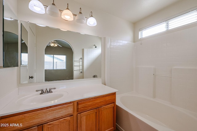 bathroom featuring bathtub / shower combination and vanity