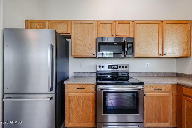 kitchen with appliances with stainless steel finishes