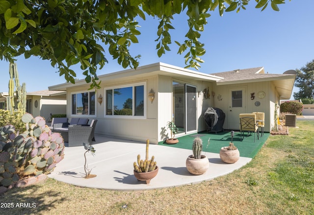 back of property featuring a patio area and central AC unit