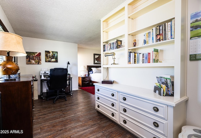 office space with dark wood-style floors and a textured ceiling