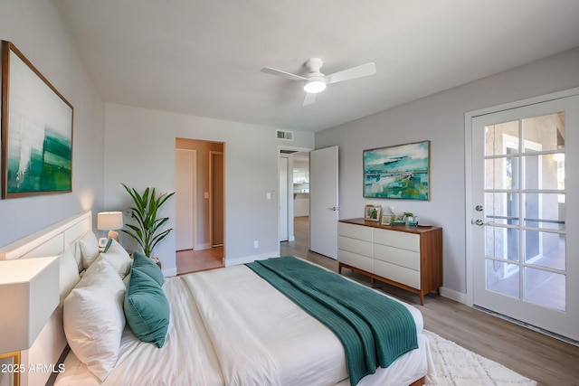 bedroom with ceiling fan, light hardwood / wood-style floors, and access to outside