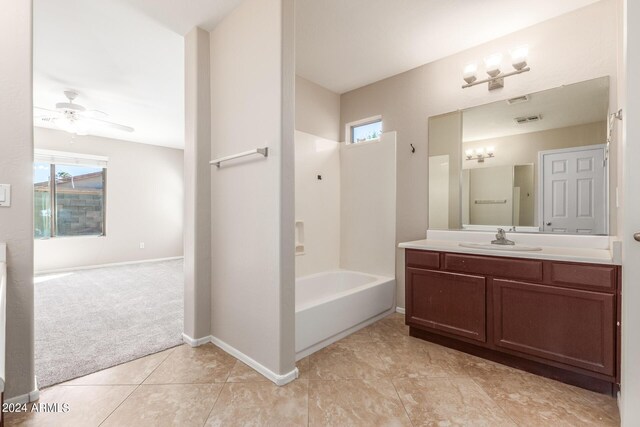 bathroom with tile patterned floors, ceiling fan, and vanity