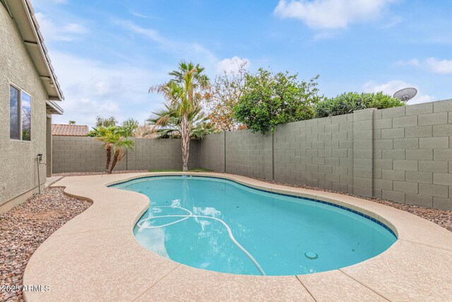 view of swimming pool featuring central AC unit and a patio