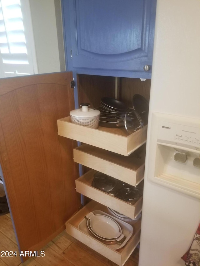 interior details featuring blue cabinetry