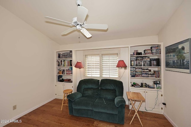 living area with ceiling fan and hardwood / wood-style flooring