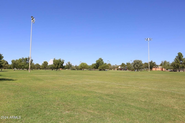 view of home's community featuring a yard