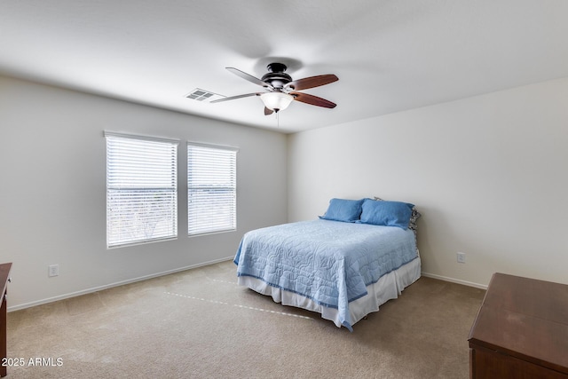 bedroom with light carpet and ceiling fan