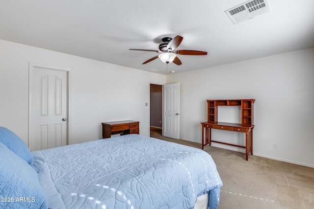 bedroom with ceiling fan and carpet