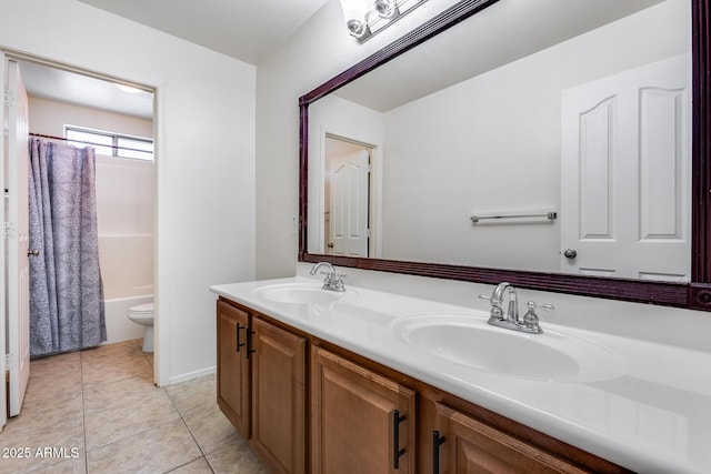 full bathroom with shower / tub combo with curtain, vanity, toilet, and tile patterned flooring